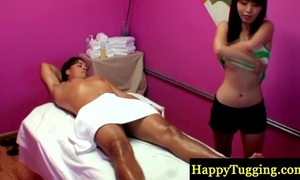 Asian masseur tugs her clients schlong