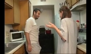 Brother and sister fellatio in the kitchen