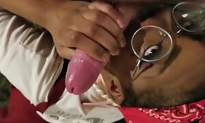 Black Barbie eagerly goes to town on a White Doms cock. CUMSHOT INC.