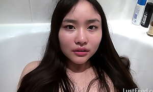 Wholesome Asian teen Sophie Hara gets caught by her flatmate while having fun in the bathtub and then they fuck passionately